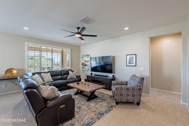 living area featuring a ceiling fan, recessed lighting, baseboards, and light tile patterned floors