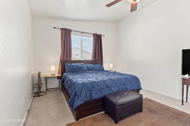 5523 W Carriage Dr, Tucson, AZ 85742 - carpeted bedroom with baseboards and a ceiling fan