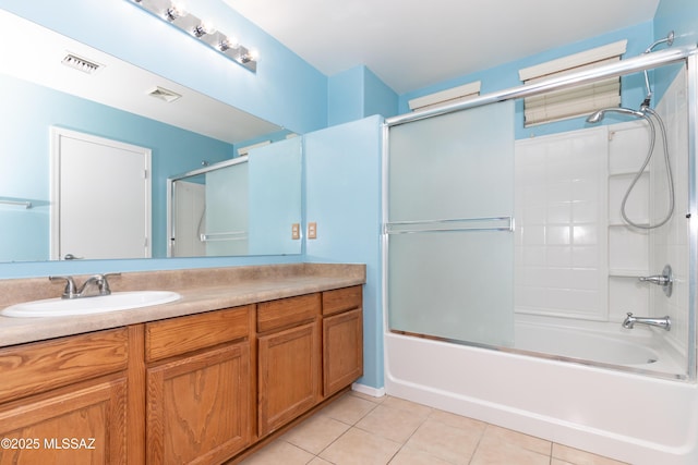 6591 S Avenida Santa Carolina, Tucson, AZ 85756 - bathroom featuring tile patterned flooring, vanity, and shower / bath combination with glass door