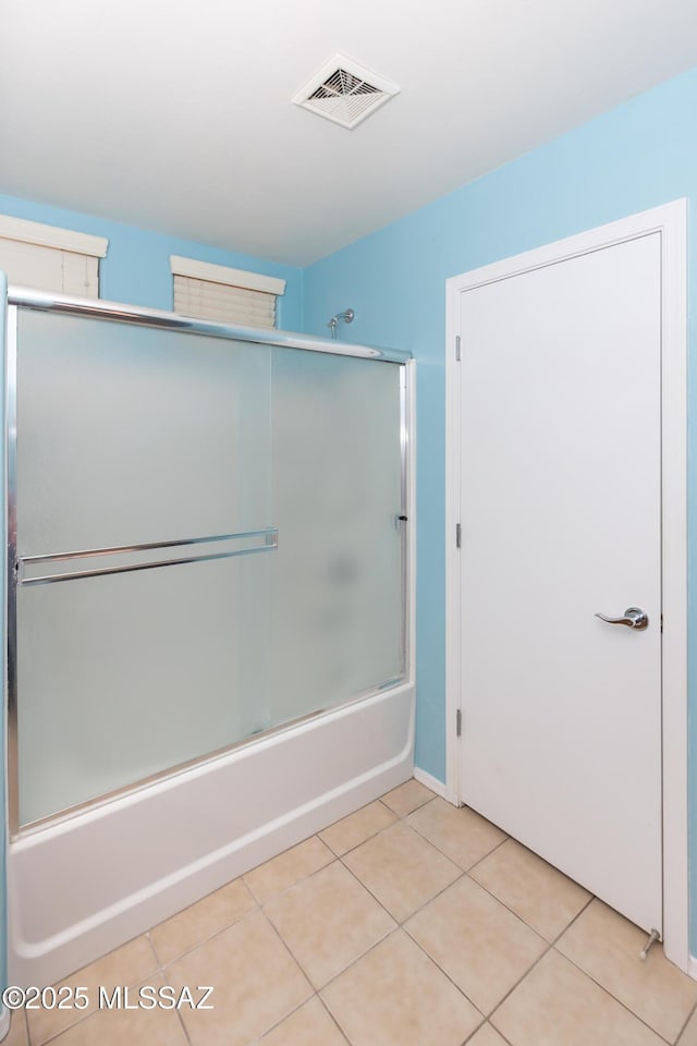 6591 S Avenida Santa Carolina, Tucson, AZ 85756 - bathroom featuring tile patterned floors and enclosed tub / shower combo
