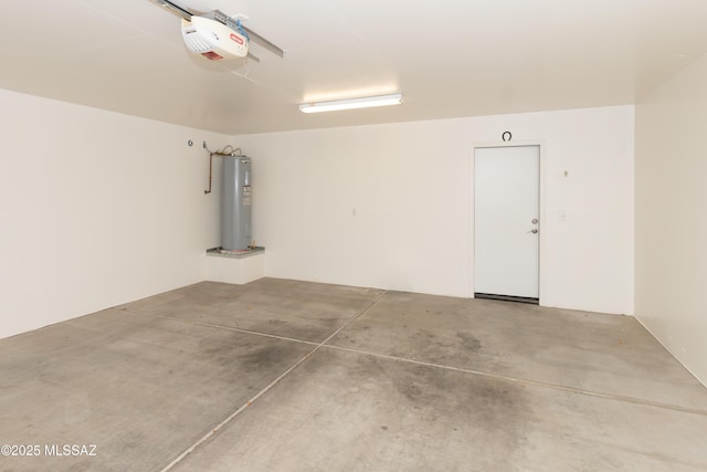 6591 S Avenida Santa Carolina, Tucson, AZ 85756 - garage with water heater and a garage door opener
