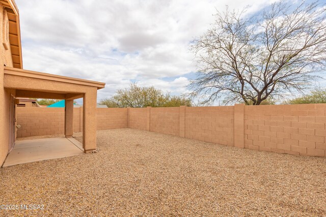 6591 S Avenida Santa Carolina, Tucson, AZ 85756 - fenced backyard with a patio area