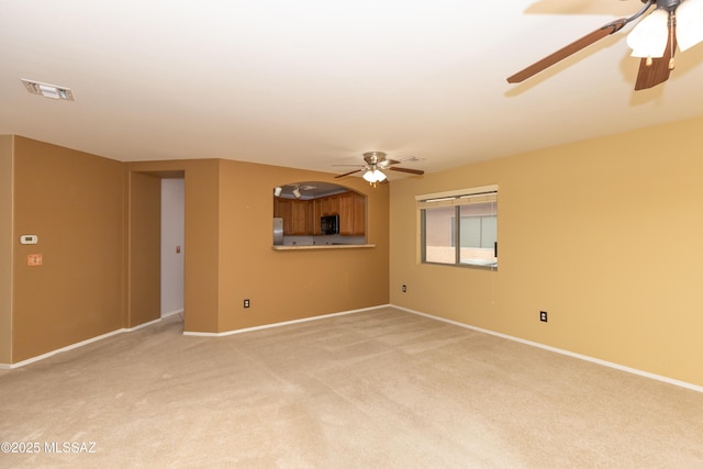 6591 S Avenida Santa Carolina, Tucson, AZ 85756 - unfurnished room featuring a ceiling fan, light colored carpet, and baseboards