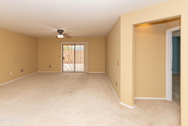 6591 S Avenida Santa Carolina, Tucson, AZ 85756 - empty room with ceiling fan, light carpet, and baseboards