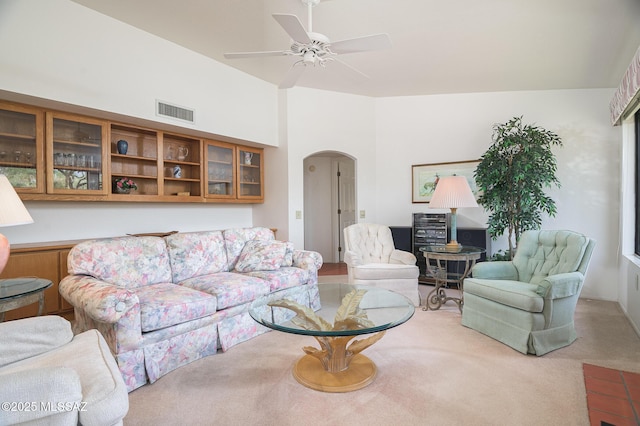 14670 N Wonderview Dr, Oro Valley, AZ 85755 - carpeted living area featuring arched walkways and ceiling fan