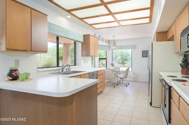 14670 N Wonderview Dr, Oro Valley, AZ 85755 - kitchen featuring a sink, range with electric stovetop, light countertops, and plenty of natural light