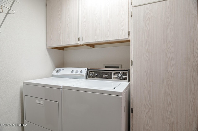 14670 N Wonderview Dr, Oro Valley, AZ 85755 - laundry area featuring cabinet space and independent washer and dryer