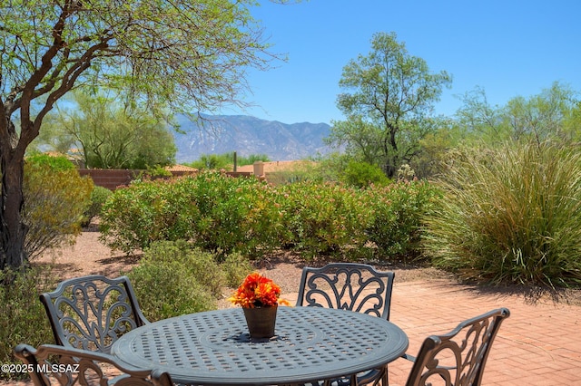 14670 N Wonderview Dr, Oro Valley, AZ 85755 - view of patio / terrace with outdoor dining area and a mountain view