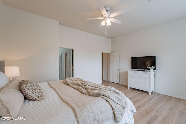 bedroom with light wood-style floors and ceiling fan