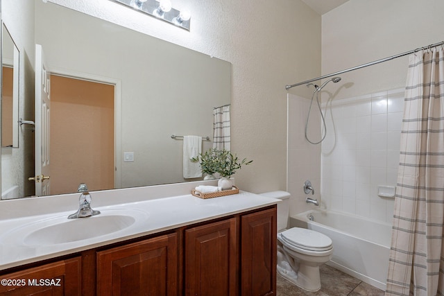 bathroom featuring shower / tub combo, vanity, toilet, and tile patterned floors