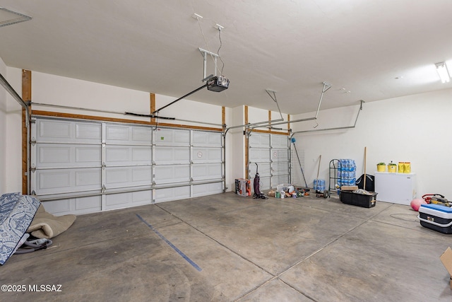 garage featuring a garage door opener