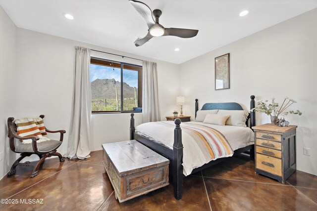 6695 W Banded Gecko Way, Tucson, AZ 85745 - bedroom with finished concrete floors, recessed lighting, and ceiling fan