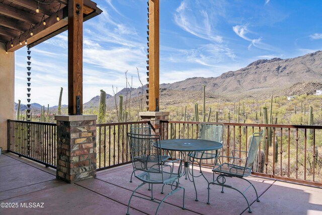 6695 W Banded Gecko Way, Tucson, AZ 85745 - view of patio featuring french doors and a mountain view
