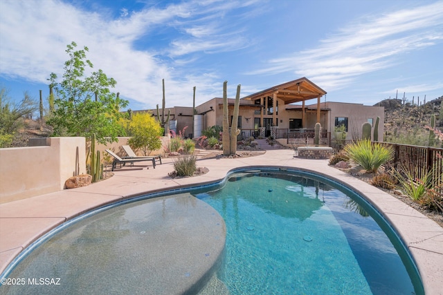 6695 W Banded Gecko Way, Tucson, AZ 85745 - view of swimming pool featuring a patio and fence