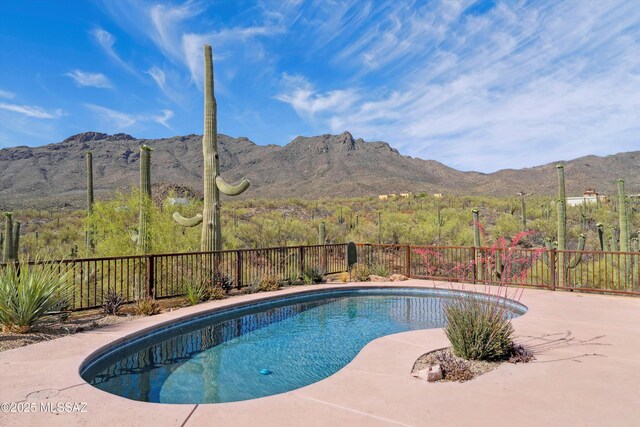 6695 W Banded Gecko Way, Tucson, AZ 85745 - view of patio / terrace featuring a mountain view and a fire pit