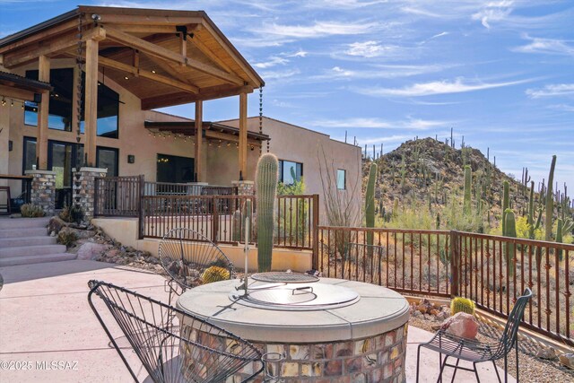 6695 W Banded Gecko Way, Tucson, AZ 85745 - view of patio / terrace featuring a mountain view
