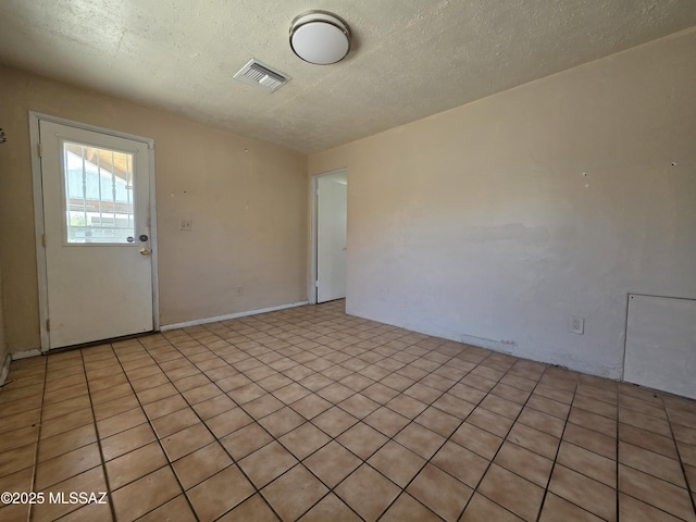 3638 S Bronson Ave, Tucson, AZ 85713 - empty room featuring a textured ceiling