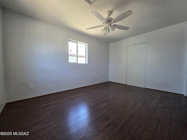 3638 S Bronson Ave, Tucson, AZ 85713 - unfurnished bedroom with dark wood finished floors and ceiling fan