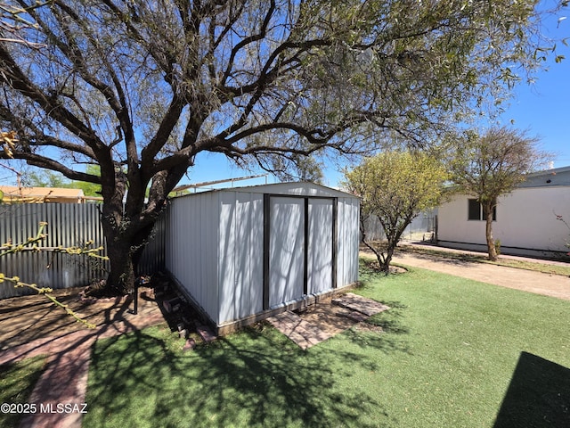 3638 S Bronson Ave, Tucson, AZ 85713 - view of yard with a storage shed and an outbuilding