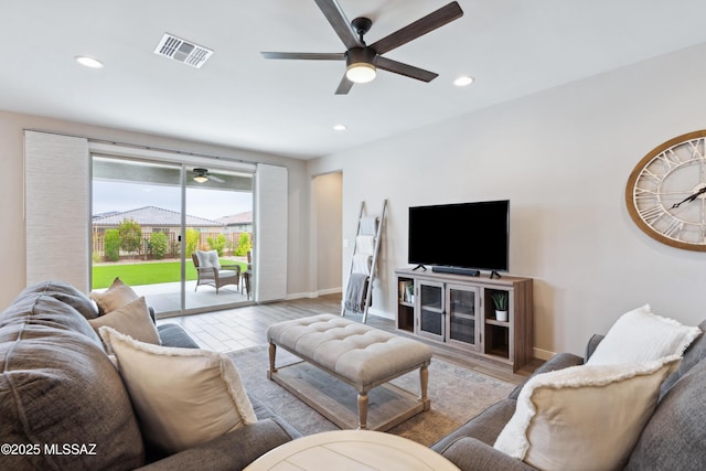 11479 N Desert Calico Loop, Tucson, AZ 85742 - living room with ceiling fan, recessed lighting, baseboards, and wood finished floors