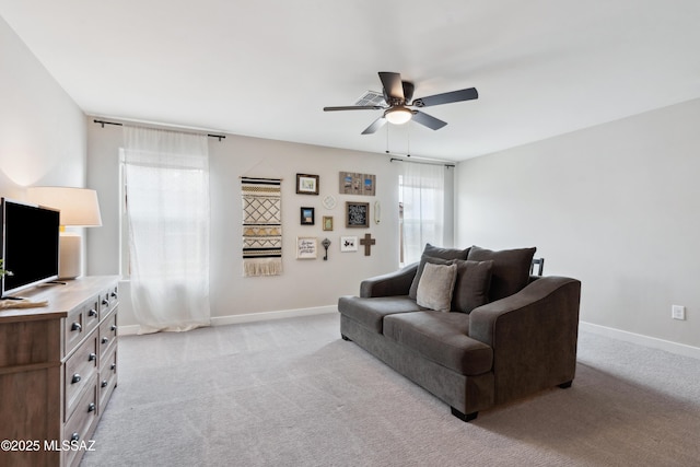11479 N Desert Calico Loop, Tucson, AZ 85742 - living room with ceiling fan, light colored carpet, and baseboards