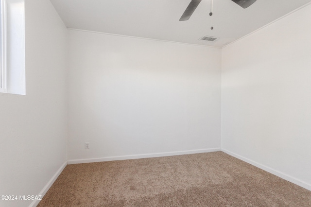 4029 E Fort Lowell Rd, Tucson, AZ 85712 - carpeted spare room with ceiling fan and baseboards