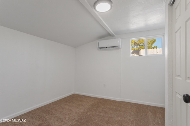 4029 E Fort Lowell Rd, Tucson, AZ 85712 - empty room featuring a wall unit AC, carpet floors, and baseboards