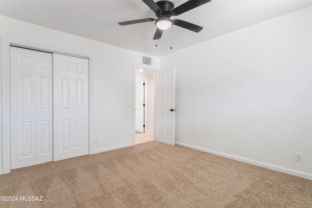 4029 E Fort Lowell Rd, Tucson, AZ 85712 - unfurnished bedroom featuring carpet flooring, baseboards, a closet, and a ceiling fan