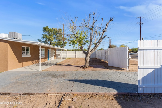 4029 E Fort Lowell Rd, Tucson, AZ 85712 - fenced backyard featuring a patio and central AC unit