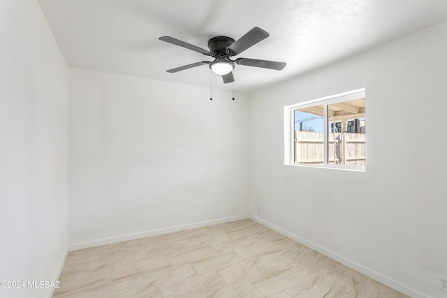 4029 E Fort Lowell Rd, Tucson, AZ 85712 - spare room with baseboards and ceiling fan