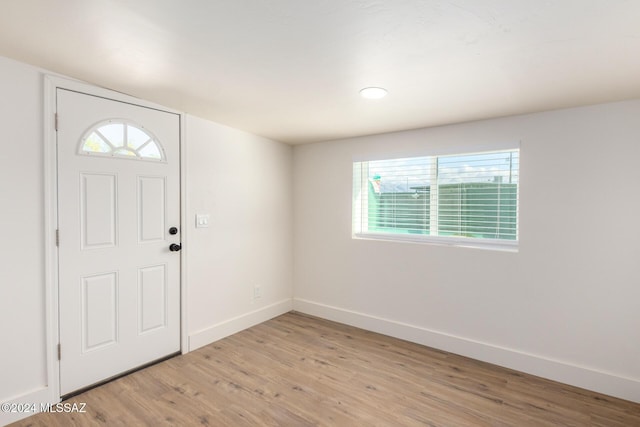 4367 N Radin Ave, Tucson, AZ 85705 - entrance foyer with light wood-style flooring, baseboards, and plenty of natural light