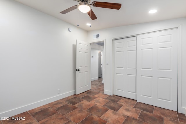 4367 N Radin Ave, Tucson, AZ 85705 - unfurnished bedroom with a closet, recessed lighting, baseboards, visible vents, and ceiling fan