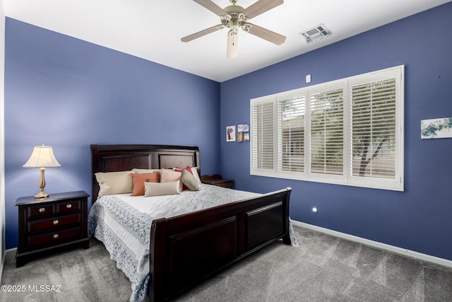 1497 W Carmel Pointe Dr, Oro Valley, AZ 85737 - carpeted bedroom featuring baseboards and a ceiling fan