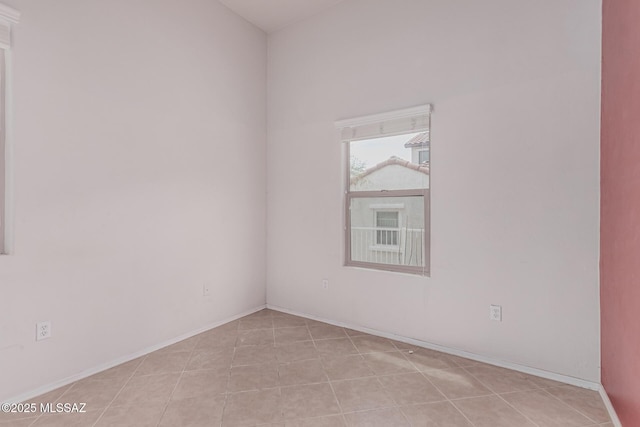 10560 E Forest Falls Ct, Tucson, AZ 85747 - unfurnished room with tile patterned flooring and baseboards
