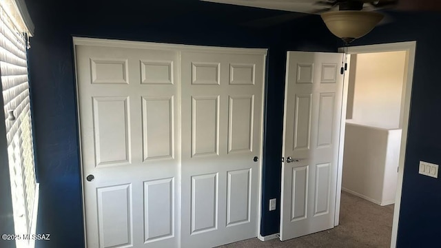 10560 E Forest Falls Ct, Tucson, AZ 85747 - unfurnished bedroom featuring carpet and a closet