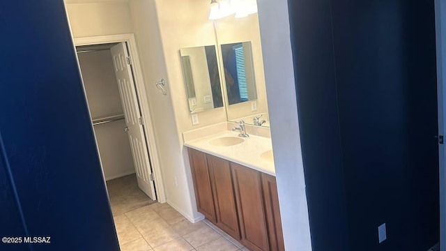 10560 E Forest Falls Ct, Tucson, AZ 85747 - bathroom featuring tile patterned floors and double vanity