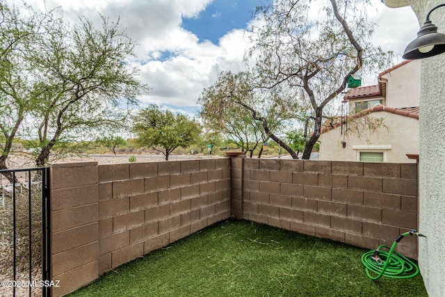 10560 E Forest Falls Ct, Tucson, AZ 85747 - view of yard featuring fence