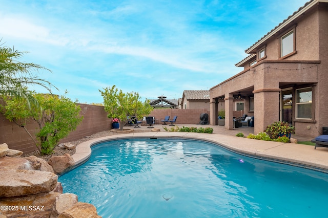 3443 W Tailfeather Dr, Marana, AZ 85658 - view of pool featuring a patio area and a fenced backyard