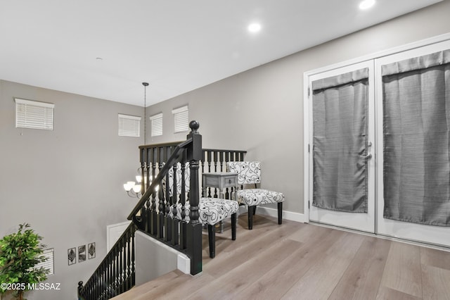3443 W Tailfeather Dr, Marana, AZ 85658 - stairs with wood finished floors, recessed lighting, and baseboards