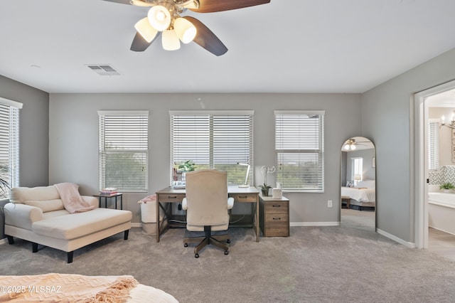 3443 W Tailfeather Dr, Marana, AZ 85658 - carpeted office featuring a ceiling fan and baseboards