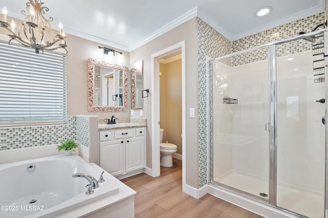 3443 W Tailfeather Dr, Marana, AZ 85658 - full bathroom with a stall shower, a chandelier, a bath, vanity, and toilet