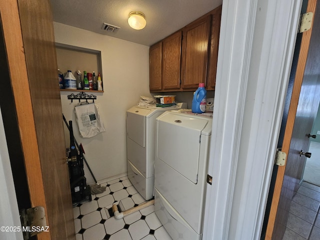 1760 W Airport Rd, Willcox, AZ 85643 - washroom featuring washer and dryer, cabinet space, and light flooring
