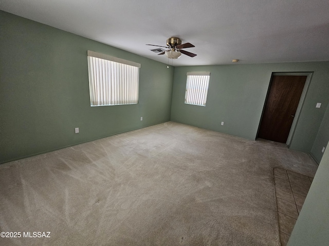 1760 W Airport Rd, Willcox, AZ 85643 - unfurnished room featuring a ceiling fan and carpet flooring