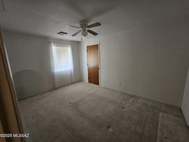 1760 W Airport Rd, Willcox, AZ 85643 - empty room featuring carpet and a ceiling fan