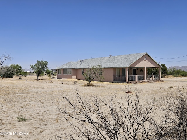 1760 W Airport Rd, Willcox, AZ 85643 - back of house with covered porch and stucco siding