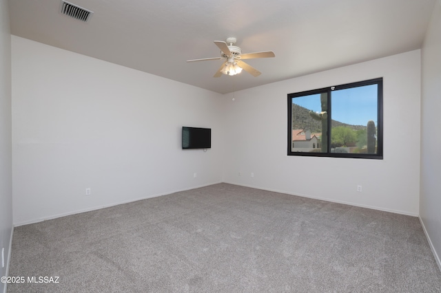 1265 Quail Point Ct, Tucson, AZ 85745 - spare room with carpet, ceiling fan, and baseboards
