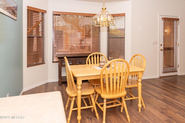 4161 W Diamond Butte Ct, Tucson, AZ 85745 - dining space with a chandelier, wood finished floors, and baseboards