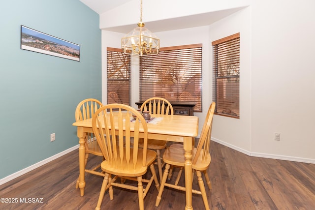 4161 W Diamond Butte Ct, Tucson, AZ 85745 - dining room with a chandelier, baseboards, wood finished floors, and vaulted ceiling