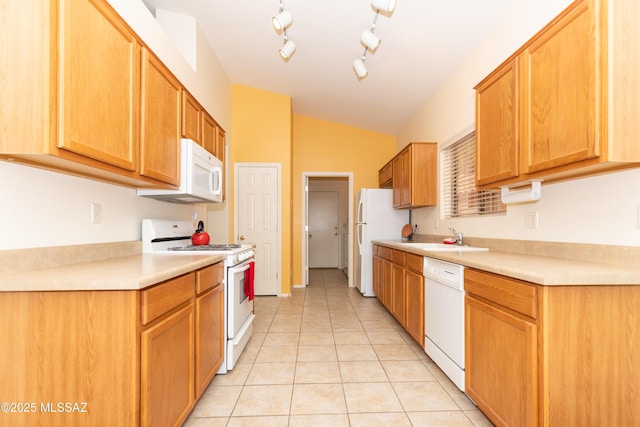 4161 W Diamond Butte Ct, Tucson, AZ 85745 - kitchen with white appliances, a sink, light tile patterned floors, light countertops, and lofted ceiling