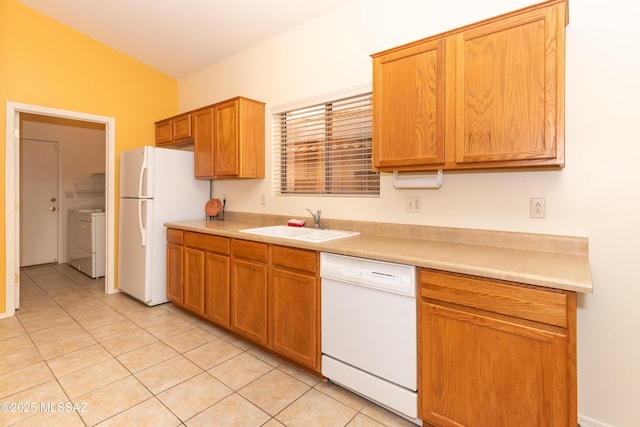 4161 W Diamond Butte Ct, Tucson, AZ 85745 - kitchen featuring white appliances, a sink, light countertops, and light tile patterned flooring